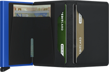 Load image into Gallery viewer, Interior view of the black and blue slim wallet. The back of the aluminum has a money clip. The right side has two credit card pockets. 
