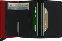 Load image into Gallery viewer, Interior view of the slim wallet. The back of the aluminum card case features a money clip. 
