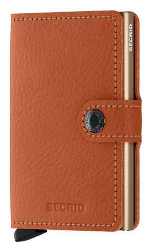 Angled front panel view of the tan colored mini wallet. 