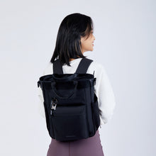 Load image into Gallery viewer, Sherpani Soleil Anti-Theft Tote/Crossbody - Carbon Black with Model
