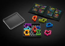 Load image into Gallery viewer, The IQ puzzle board with the pieces and booklet. 
