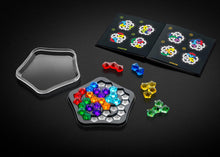 Load image into Gallery viewer, The IQ Pentagon game board,  pieces, and booklet arranged on a background.
