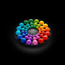 Load image into Gallery viewer, Colorful round puzzle on a black background
