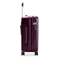Load image into Gallery viewer, Side view of the plum-colored hard shell suitcase with the telescopic handle partly extended. A grabbing handle and a three-digit TSA combination lock are visible
