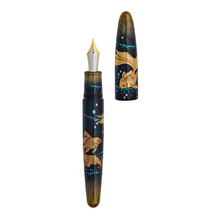 Load image into Gallery viewer, Fountain pen with goldfish design on a white background, the pen is uncapped showing the two toned nib.
