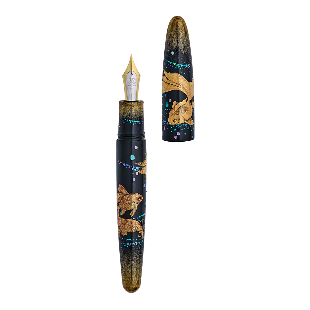 Fountain pen with goldfish design on a white background, the pen is uncapped showing the two toned nib.