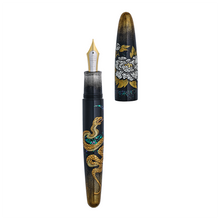 Load image into Gallery viewer, Fountain pen with snake and floral design on a white background, the pen is uncapped demonstrating its two toned nib.
