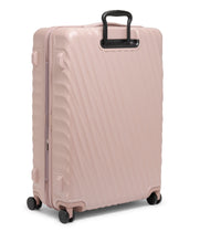 Load image into Gallery viewer, Back panel view of the mauve colored suitcase with black accents. It features a sleek diagonal ridged texture.
