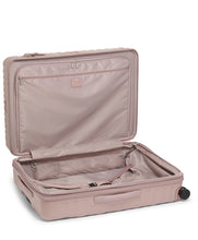 Load image into Gallery viewer, Interior view of the suitcase showing a zipper-closing panel divider, organizational pockets, and a set of straps to keep contents in place. 

