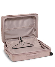 Load image into Gallery viewer, Interior view of the suitcase showing the garment bag with a hanger to hold your outfits. 

