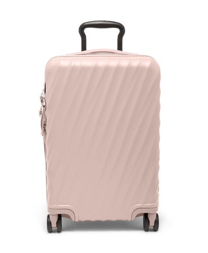 Front panel view of the mauve colored suitcase with black accents. It features a sleek design with diagonal ridges on the front and back panel.
