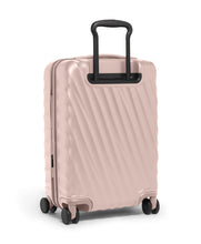 Load image into Gallery viewer, Angled view of the suitcase showing the sleek diagonal ridged pattern on the back panel. 
