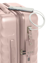 Load image into Gallery viewer, Close up to the side panel of the suitcase, showing a USB plug above the Contact info tag which can be used to charge your mobile devices on the go. Portable battery not included. 
