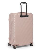 Load image into Gallery viewer, Angled back panel view of the mauve colored suitcase. 
