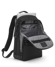 Load image into Gallery viewer, Angled front panel view of the black backpack with the main compartment opened and a laptop peeking from the back compartment. 
