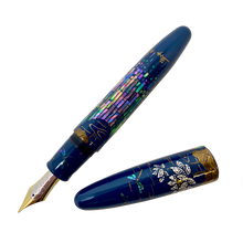 Load image into Gallery viewer, Front view of the fountain pen with the cap set to the side. 
