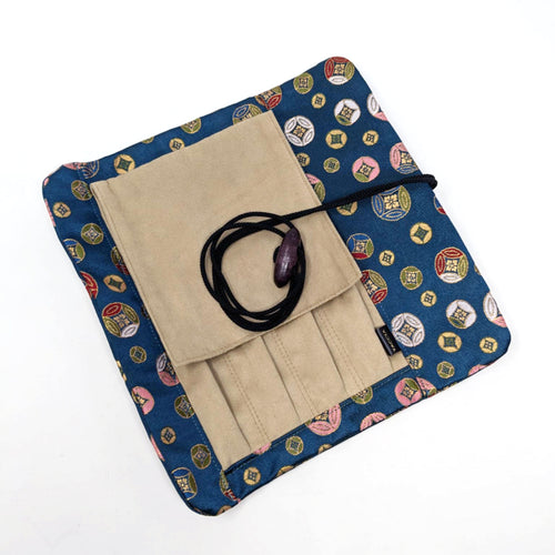 The Edo Komon kimono pen case unrolled, with a blue traditional japanese kimono pattern. 