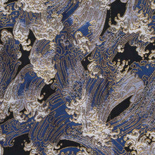Load image into Gallery viewer, Close up to the Wave kimono pen roll featuring a black background, blue with white waves, and gold stitching.
