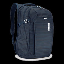 Load image into Gallery viewer, Angled front panel view of the blue backpack. 
