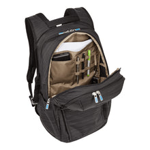 Load image into Gallery viewer, Angled top view of the backpack with the main compartment unzipped. A battery bank, pens, and notebook fill the pockets. (Accessories not included).

