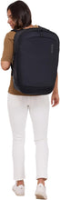 Load image into Gallery viewer, A young woman carrying the backpack on her back. 
