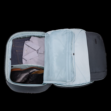 Load image into Gallery viewer, Interior view of the backpack. filled with clothes and a pair of shoes. They are organized with the panel divider. 
