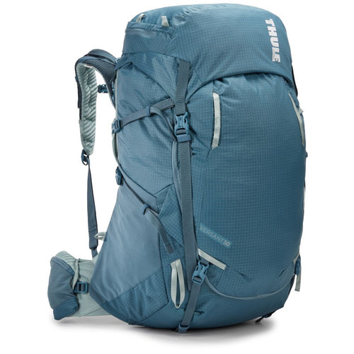 Angled front panel view of the blue backpack with the adjustable straps extended. 