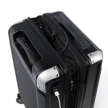Load image into Gallery viewer, Top panel view of the black suitcase showing a USB used to charge your mobile devices. (A battery bank is required and not included).
