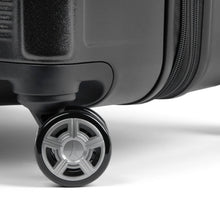 Load image into Gallery viewer, Close up to a wheel.
