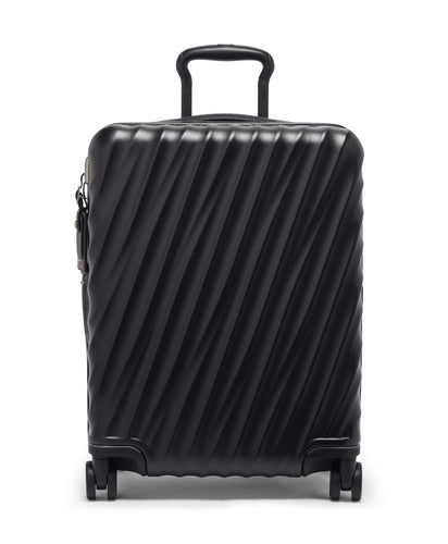 Front panel view of the black hardshell suitcase. The telescopic handle is partly extended. 