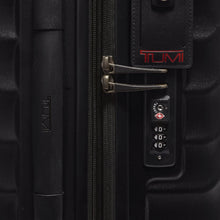 Load image into Gallery viewer, Side panel close up on the TSA approved, three-digit combination lock. 
