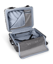 Load image into Gallery viewer, Interior view of the suitcase showing the zipper-closing dividers opened. 
