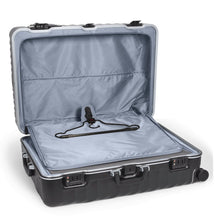 Load image into Gallery viewer, Interior view of the suitcase showing the front panel&#39;s garment holder unzipped. 
