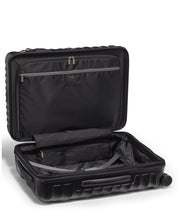 Load image into Gallery viewer, Interior view of the suitcase. It features a zipper-closing panel divider on the front side, and a set of adjustable straps on the back side.
