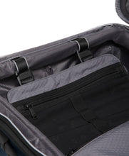 Load image into Gallery viewer, Close up to the interior of the blue suitcase showing a zipper-closing bag.
