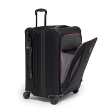 Load image into Gallery viewer, Angled front view of the suitcase with the front panel&#39;s pocket unzipped.
