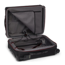 Load image into Gallery viewer, Interior view of the suitcase showing the garment hanger in the front panel.
