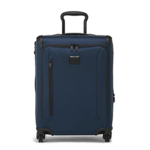 Load image into Gallery viewer, Front panel view of the blue suitcase with the telescopic handle partly extended. 
