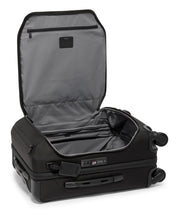 Load image into Gallery viewer, Interior view of the suitcase with the front panel lifted. The lid has a zipper-closing compartment. 
