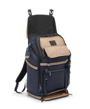 Load image into Gallery viewer, Angled front panel view of the backpack with the compartments unzipped. 
