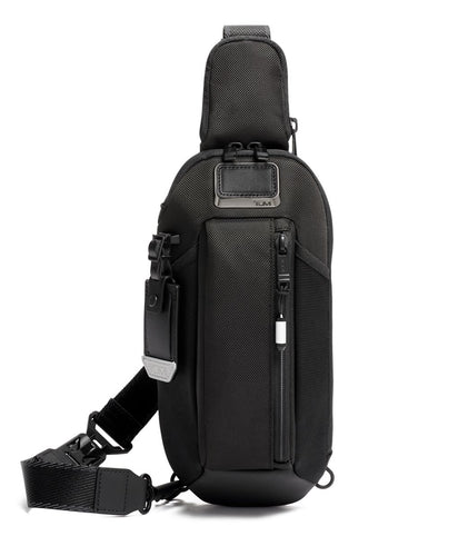 Front panel view of the black sling bag.