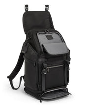 Load image into Gallery viewer, Angled front view of the backpack with the front panel&#39;s compartments opened. 
