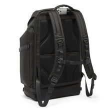 Load image into Gallery viewer, Angled back panel view of the backpack showing the adjustable straps. 
