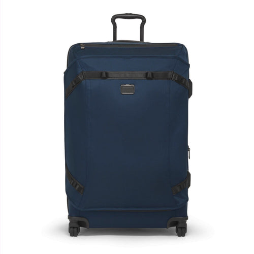 Front panel view of the soft sided blue suitcase with black accents. 
