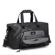 Load image into Gallery viewer, Angled front view of the satchel with the front panel unzipped
