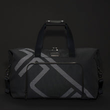 Load image into Gallery viewer, Front panel view of the satchel on a black background. 
