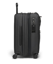 Load image into Gallery viewer, Side panel view of the suitcase with the expandable feature unzipped. It features a grab handle and a tag.
