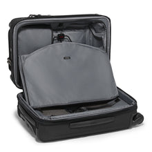 Load image into Gallery viewer, Interior view of the suitcase featuring the foldable garment holder. 
