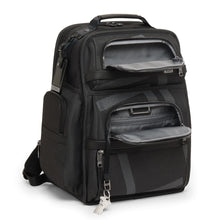 Load image into Gallery viewer, Angled front view of the backpack with the front pockets unzipped. 
