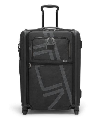 Front panel view of the suitcase with the telescopic handle extended. 